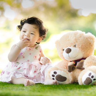 young child with plush bear